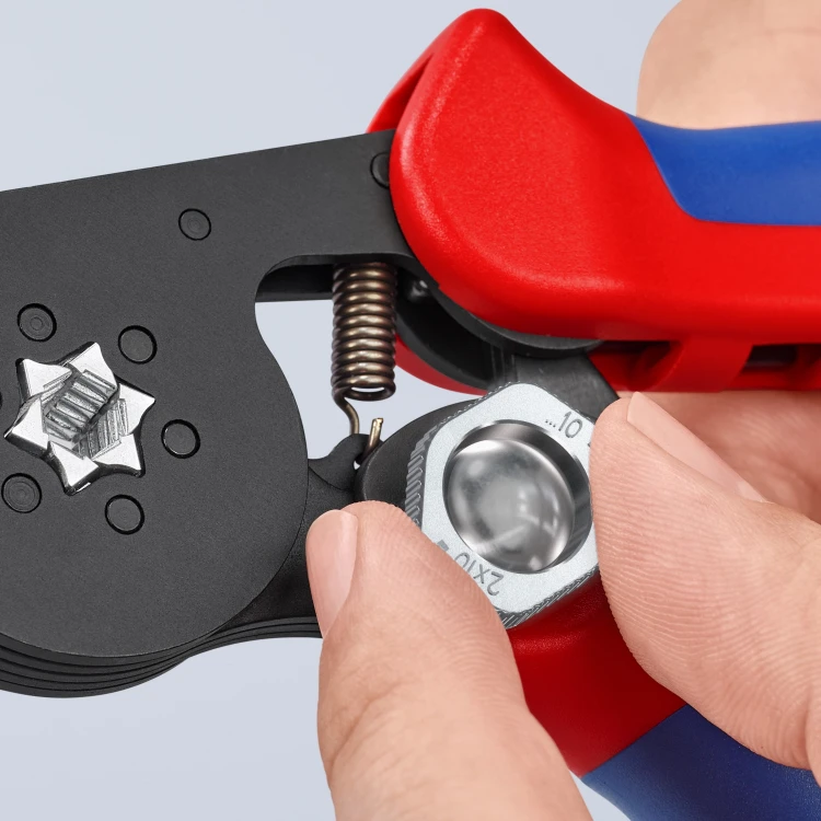Praska Knipex 97 53 14 – zbliżenie sześciokątnej matrycy i pokrętła ustawianego do tulejek Twin